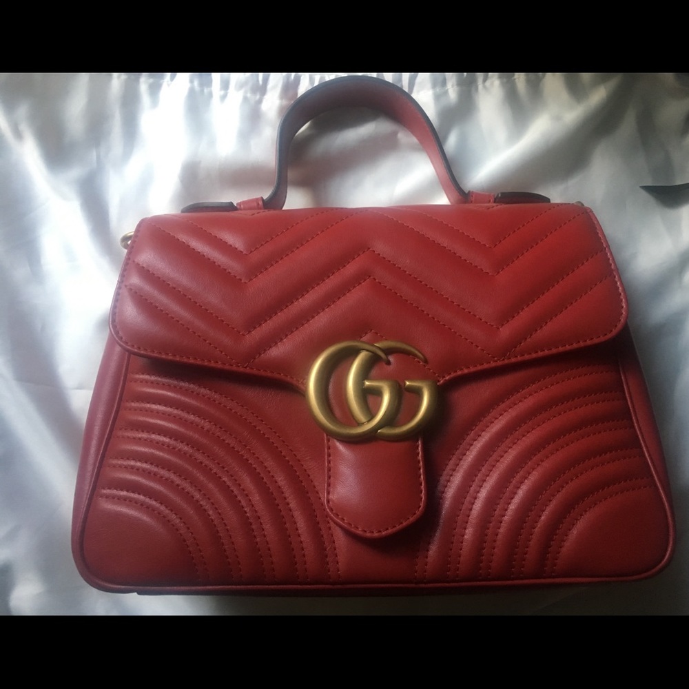 Gucci Small Marmont Top handle in Hibiscus red.